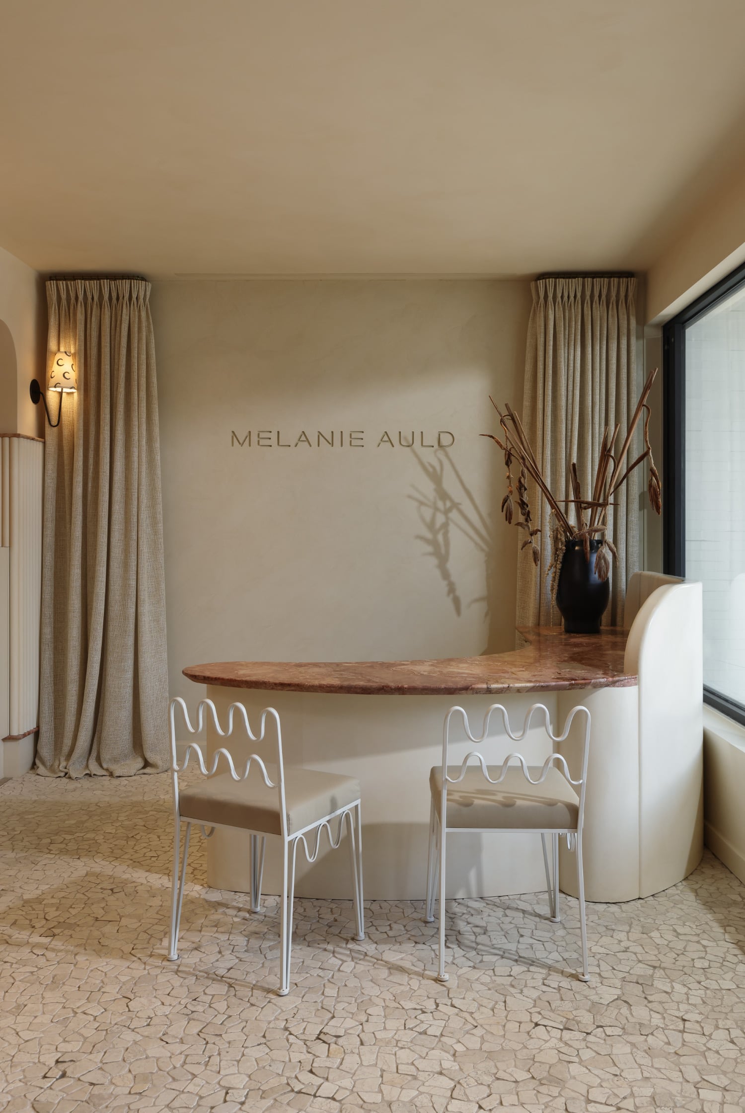 Step into luxury at Melanie Auld's Vancouver boutique, crafted by Gillian Segal. Explore a blend of European charm and contemporary style from one of the top interior designers in Vancouver.